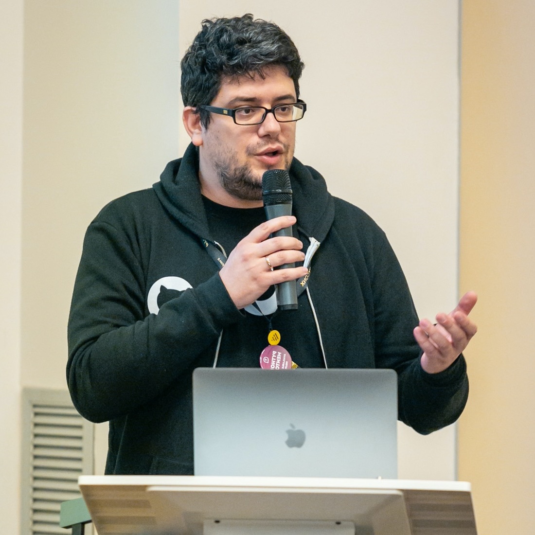 Andrea speaking at PyCon Italy